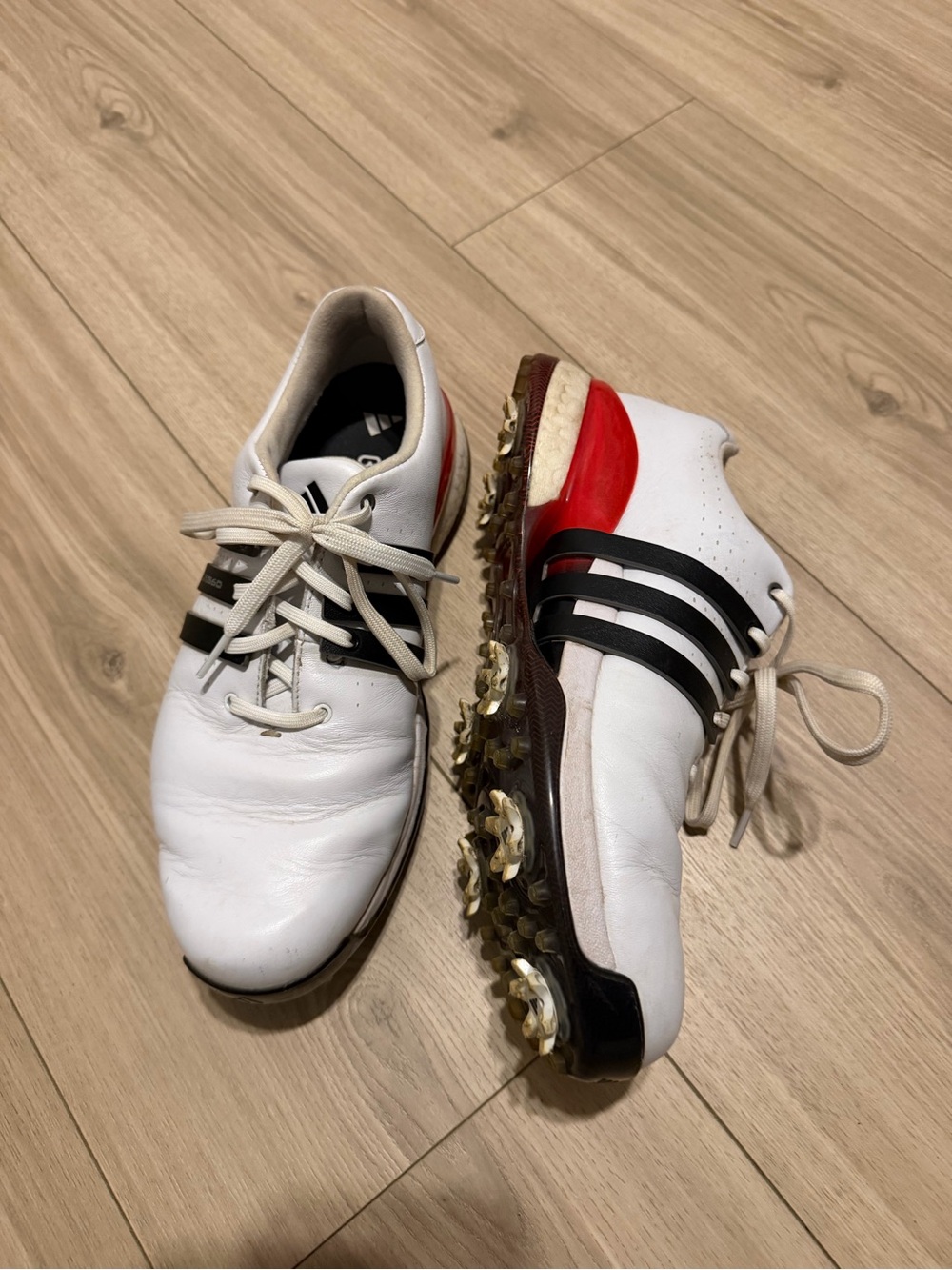 adidas White Athletic Golf Shoes with Black Stripes and Red Heel